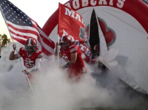 Rigby’s running game sparks a late charge as Trojans down Madison in key rivalry matchup
