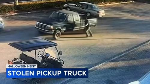 Employee nearly hit after truck stolen from drive-thru Halloween light show in Washington Twp., New Jersey