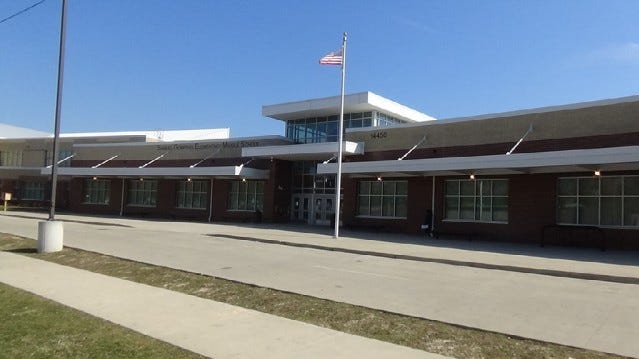 Mother, student arrested in classmate's stabbing at Detroit school