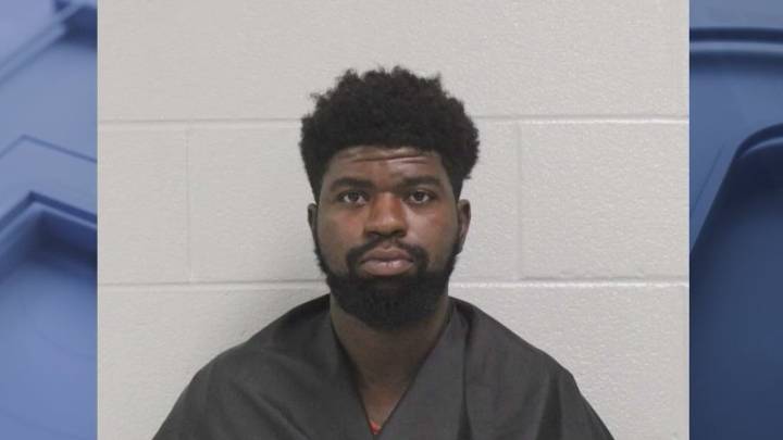 Carrollton man charged in child assault after peeping incidents