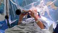 Parkinson's patient plays clarinet during brain surgery