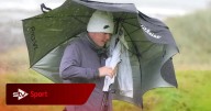 Robert MacIntyre battles brutal conditions to take share of lead at St Andrews