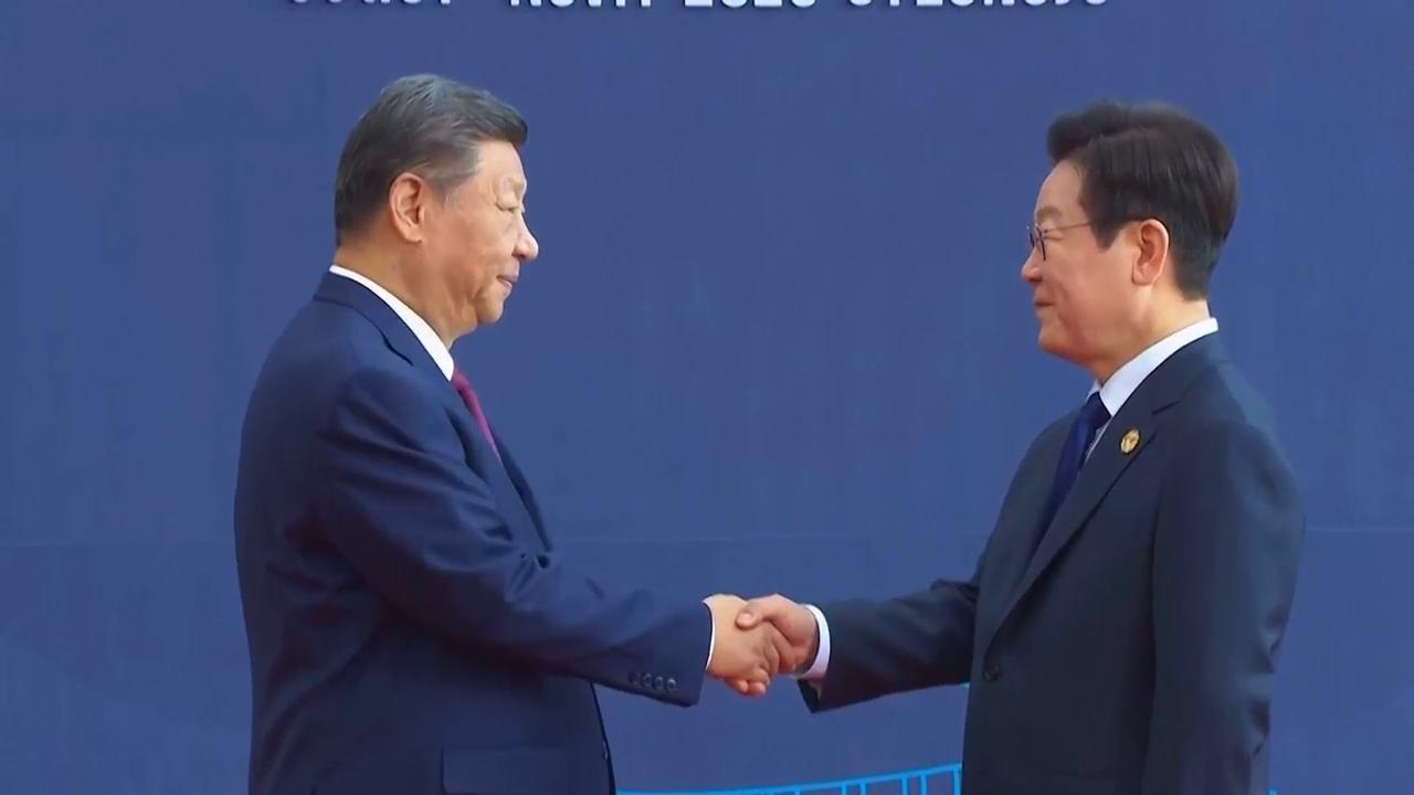 China president takes center stage on first day of APEC summit in Gyeongju; AP explains