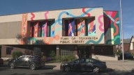 New mural brings color and community pride to Kenmore library