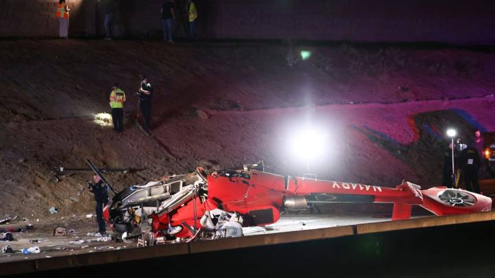Medical helicopter crashes on Sacramento highway as motorists rescue trapped woman, three aboard critical