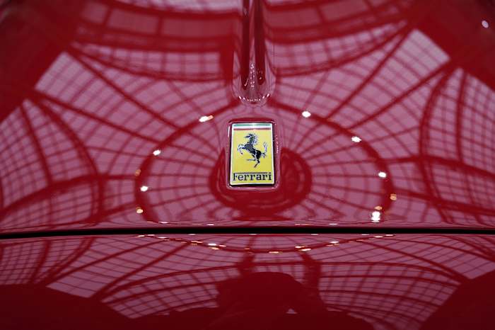 Ferrari reveals features of first fully electric vehicle, raises 2026 forecasts