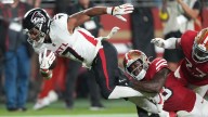 Falcons fans incensed after Bijan Robinson sits on bench during key fourth down