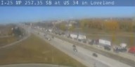 1 dead after semi truck rolls over on I-25 in northern Colorado