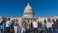 Judge temporarily blocks Trump administration from firing workers during US government shutdown