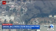 Fire at Inglewood commercial building sends up plume of black smoke