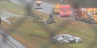 Plane crashes onto a Massachusetts highway, killing 2 and wounding 1 on the ground