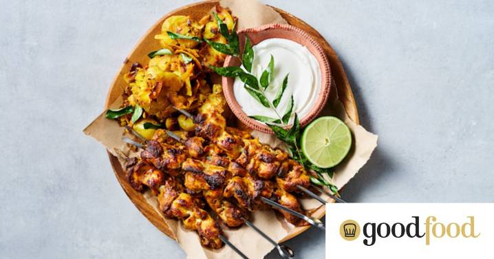 Chicken tikka skewers with crunchy coconut potatoes is dinner on a stick