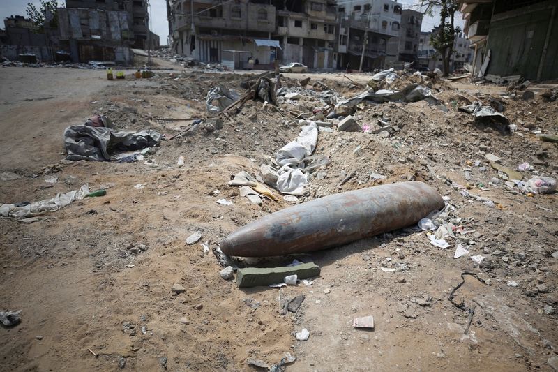 Clearing Gaza's surface of bombs will take up to 30 years, aid group says