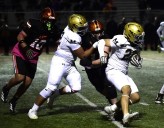 Michigan football’s Mason Bonner leads Mullen past Erie