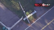 At least two utility poles down in Medford
