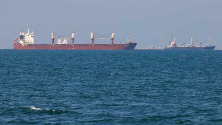 British ship ablaze after being struck off the coast of Yemen, officials say