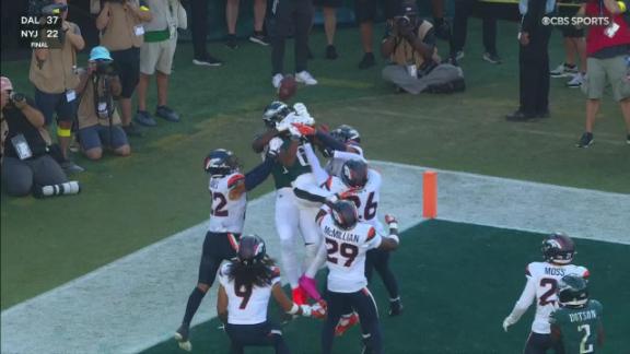 Broncos rally from 14-point deficit to hand Eagles their first loss of the season, 21