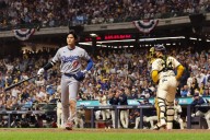 Shohei Ohtani talks playoff skid, then hits ball off the roof in batting practice