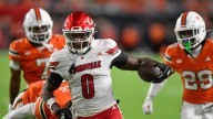 Louisville intercepts 4 of Beck's passes, tops No. 2 Miami 24-21 to end Hurricanes' home streak