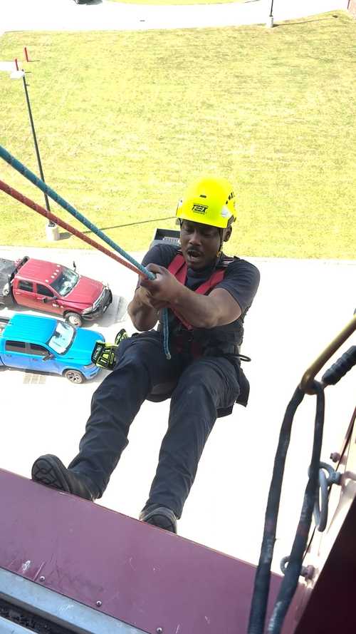 Sheldon firefighter faced his fear of heights head-on and the world watched in awe
