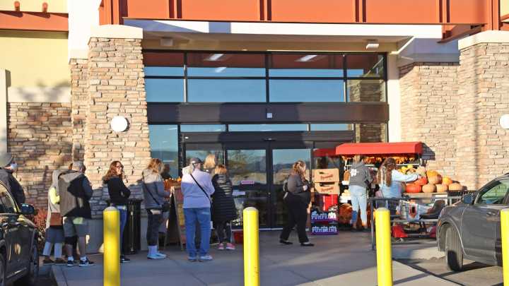 Crowds line up for Trader Joe’s Halloween mini tote bags