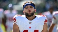 Giants RB Cam Skattebo taken to hospital with dislocated ankle