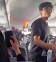 Terrifying moment fire breaks out on plane travelling at 33,000ft