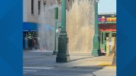 Water bursts from manhole at Royal and Canal Street in New Orleans
