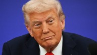 Trump posts AI video showing him dumping on ‘No Kings' protesters