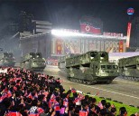 North Korea reports holding 'grand' military parade