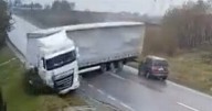 Moment jackknifed lorry crushes car killing two after losing control on slippery road