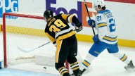 Fan at Pittsburgh Penguins game hospitalized after falling from upper concourse at PPG Paints Arena