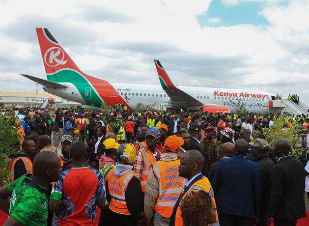Kenyan police fire at mourners as violence erupts at viewing of body of ex