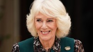 Queen Camilla pays tribute to 'much-missed' friend Jilly Cooper in leopard print outfit the late author would approve of