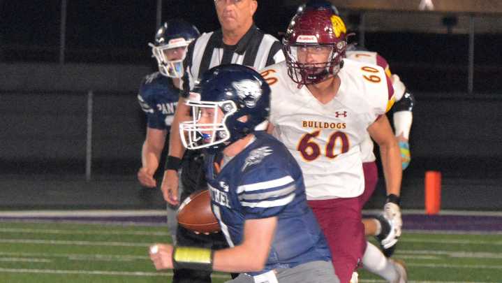 Great Plains Lutheran quarterback Jarret Bauer catches a pass