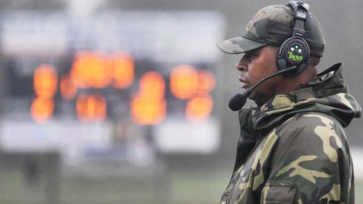 Hinson returns to familiar territory, leads Camden football to wet win