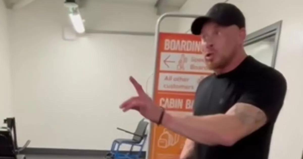 EasyJet passenger filmed raging with staff in row over hand luggage size