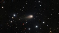 Interstellar comet swinging past Mars as a fleet of spacecraft looks on