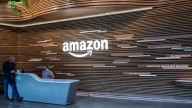 Amazon lays off thousands of corporate workers as it spends big on AI