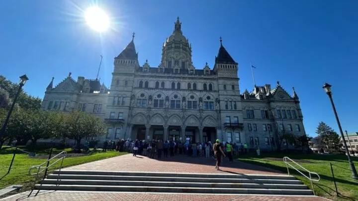 Dozens gather on capitol steps to advocate for increased protections for immigrants