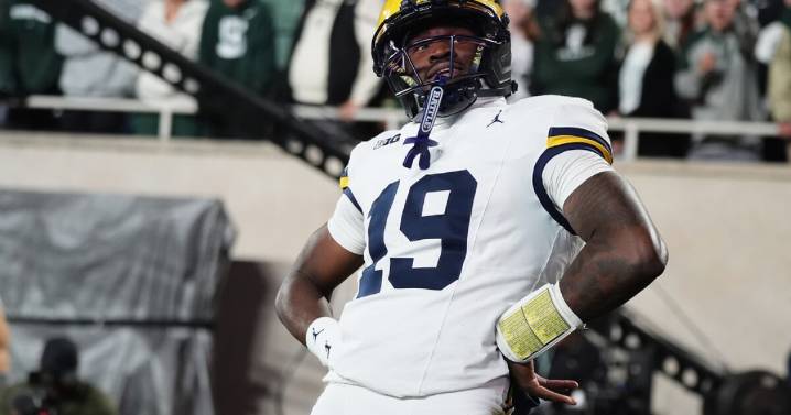 Justice Haynes runs for 152 yards and 2 TDs as No. 25 Michigan beats Michigan State 31