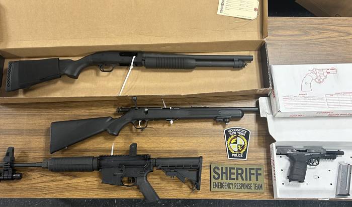 Firearms seized, Woodstock man arrested following shotgun discharge