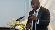 Former NFL standout Whitney Mercilus gives APS Athletics HOF speech