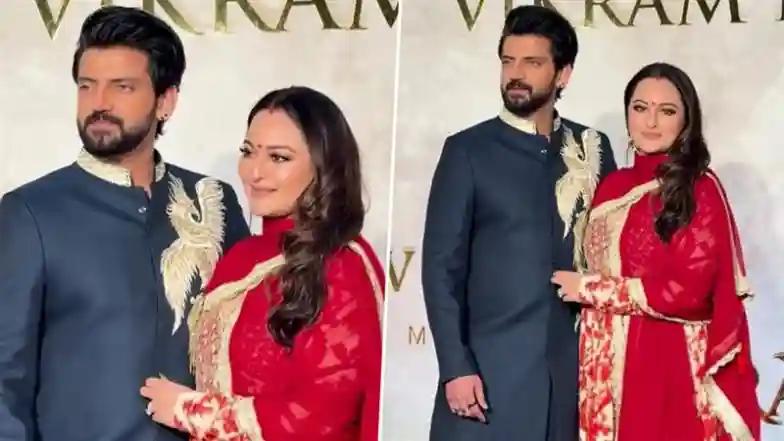 Bollywood Sonakshi Sinha Sparks Pregnancy Buzz After Fans Notice Her Covering Belly While Posing With Husband Zaheer Iqbal at Vikram Phadnis’ 35th Anniversary Fashion Show (Watch Video)