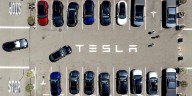 Parents of 2 students killed in Tesla allege design flaw trapped them in the burning car