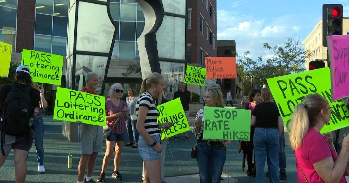 Protesters stand on opposed ideas for ending homelessness