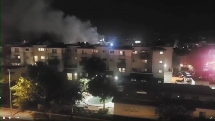 Firefighters battle garage fire at a Canoga Park apartment