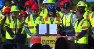'Took all of us.' Whitmer signs long-term road funding bill in Clinton Township