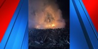 Officials: Crews contain fire at mulch facility in Henderson County
