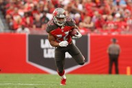 Ex-NFL star Doug Martin was reportedly in police custody when he died
